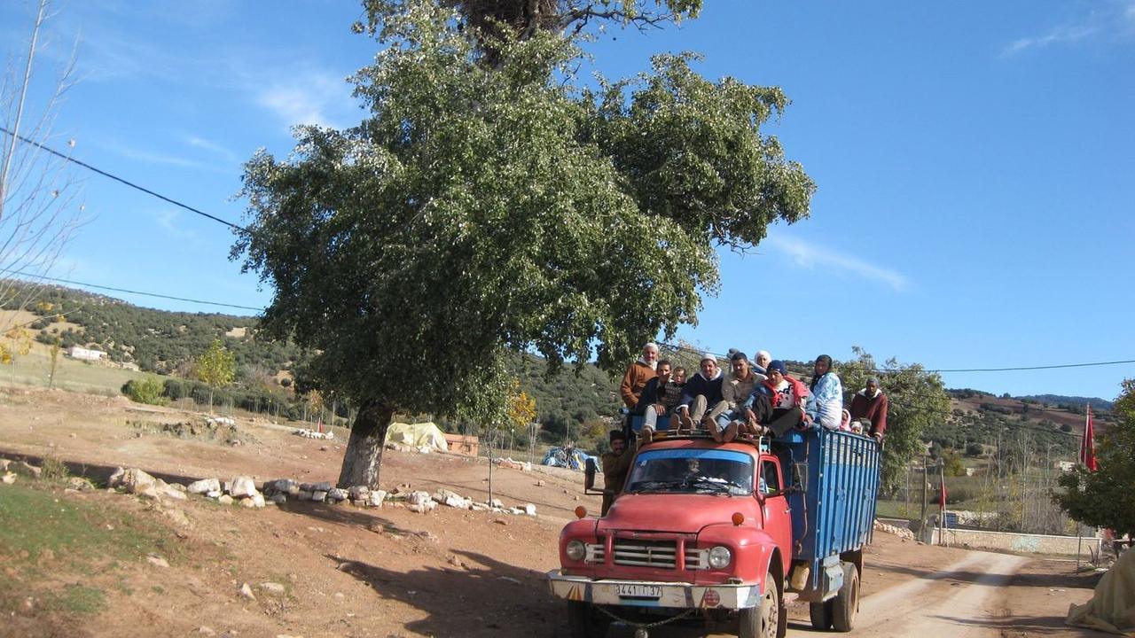 Bus terminal in Morocco with coaches ready for departure