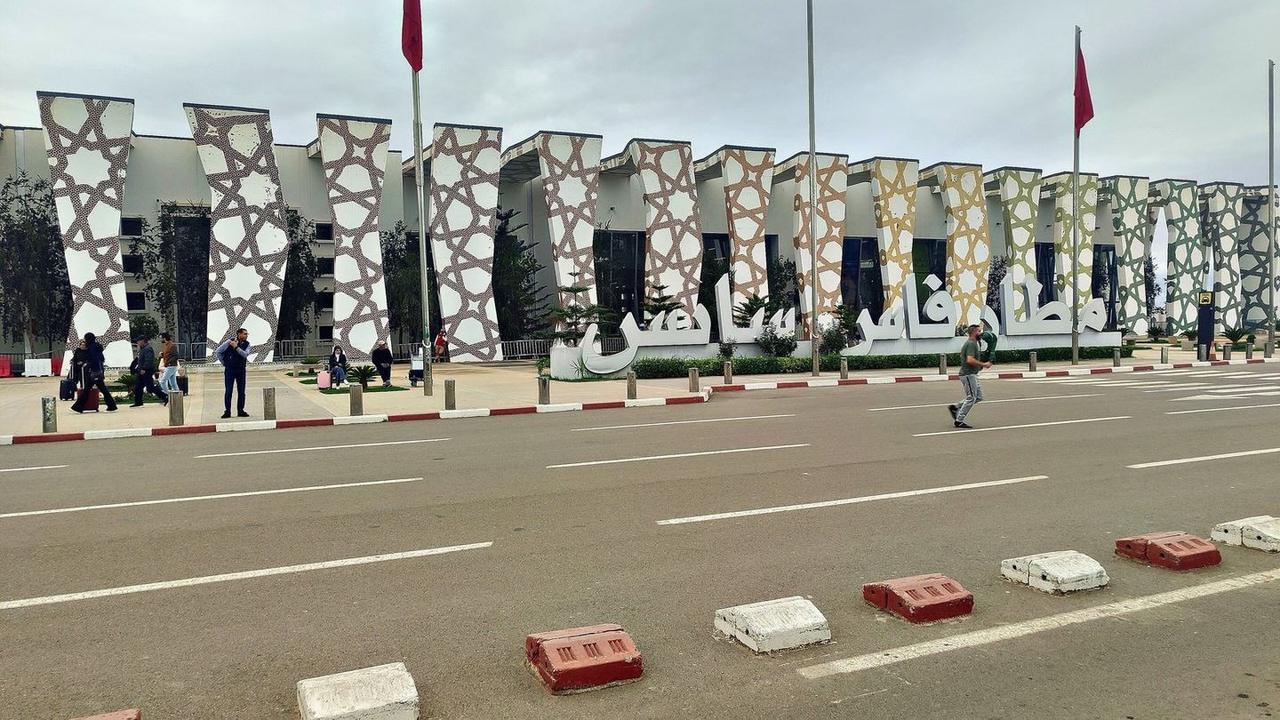 Travelers arriving at Fes Airport and planning the city transfer