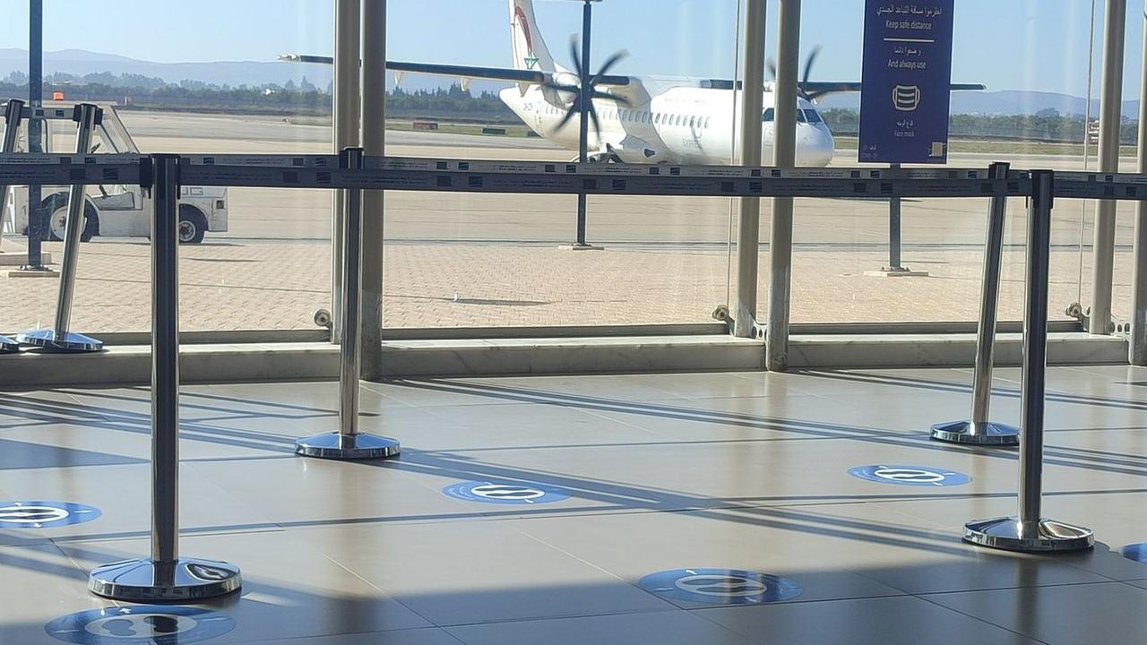 Travelers arriving at Fes Airport and planning the transfer to the medina
