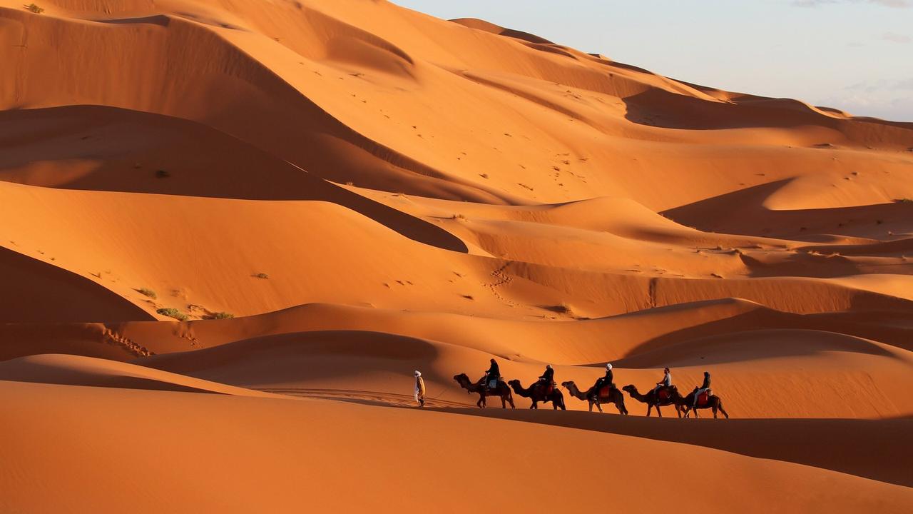 Travelers planning how to get to Merzouga without renting a car